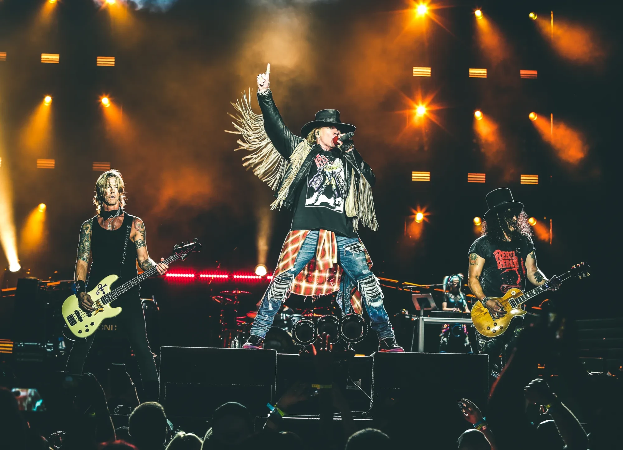 Guns N' Roses performing live on tour